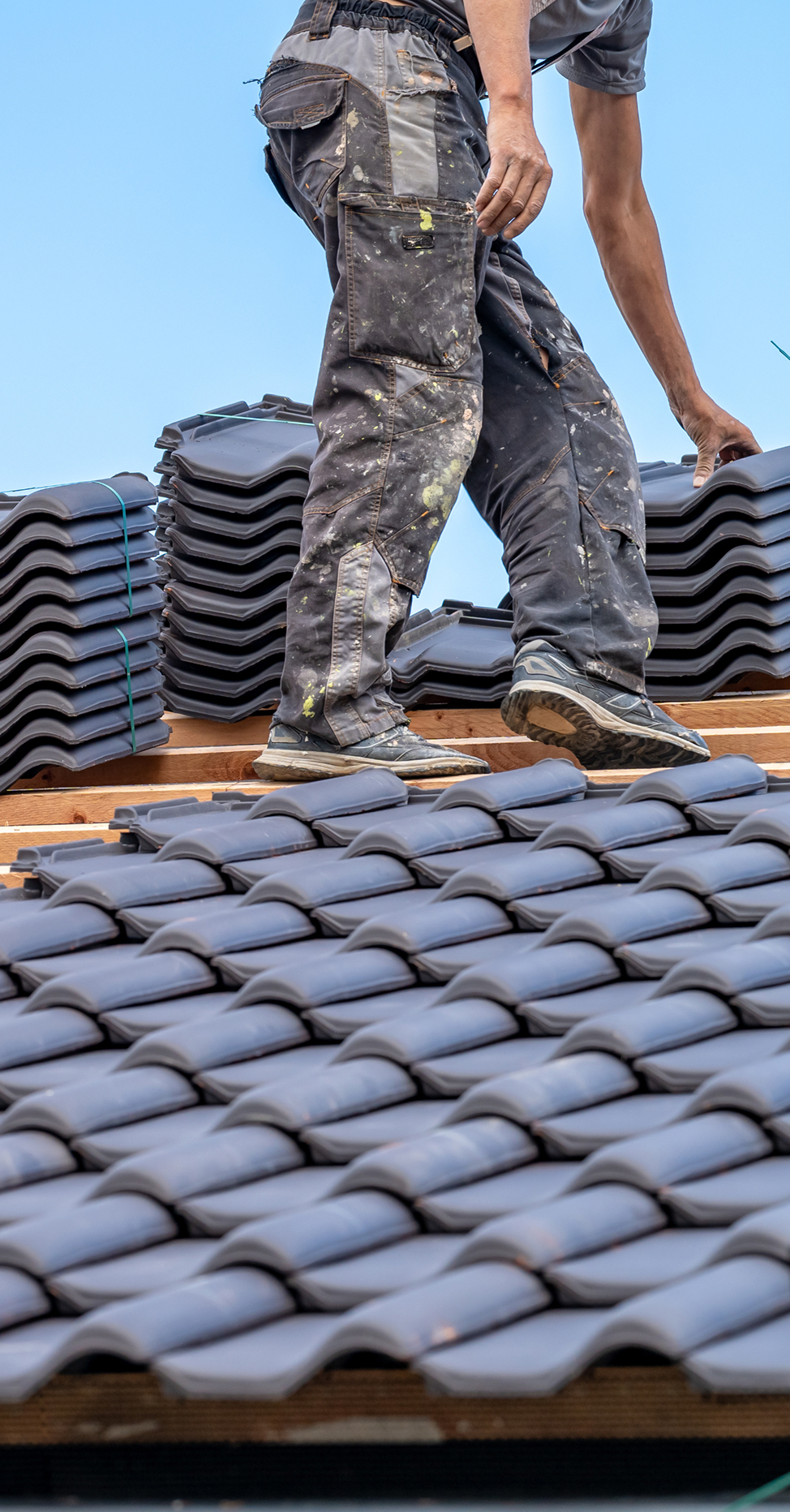 man on a roof image